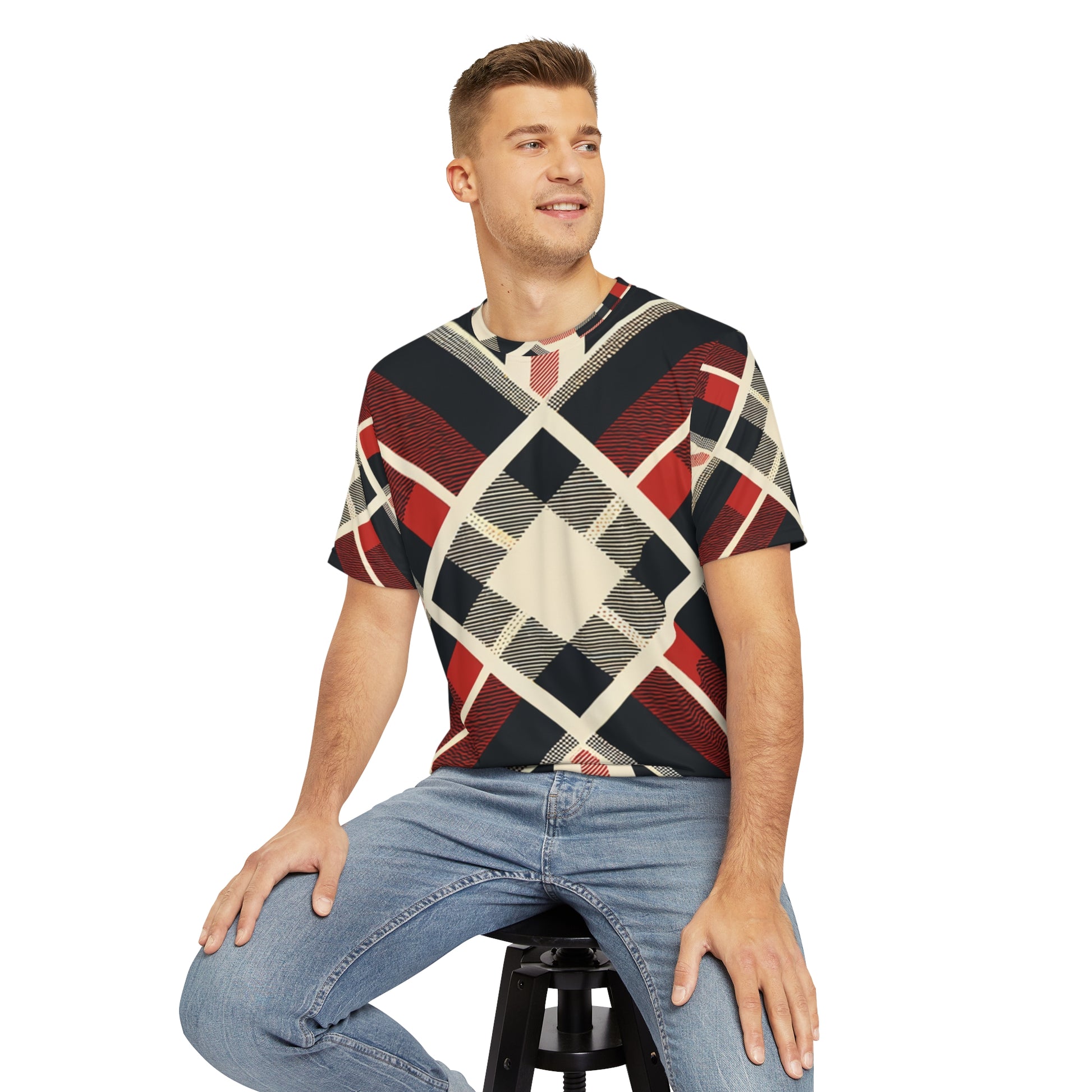 Front view of the Metropolitan Tartan Fusion Crewneck Pullover All-Over Print Short-Sleeved Shirt black red beige plaid pattern paired with casual denim pants worn by a white man sitting down on a stool chair