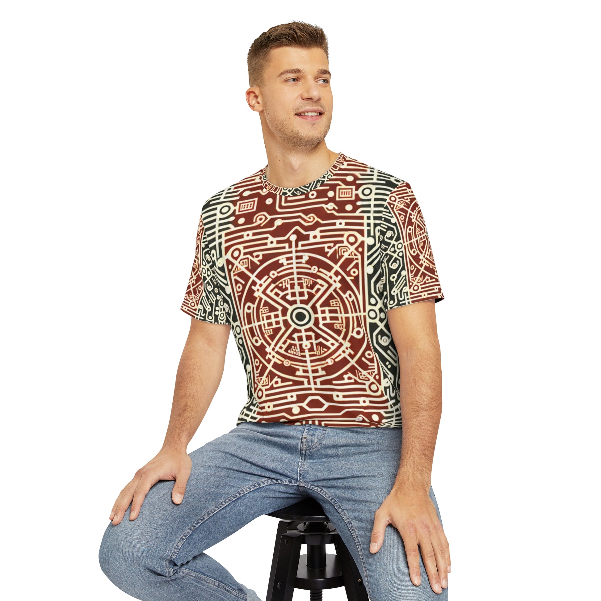 Front view of the Circuitry Symphony in Sepia Crewneck Pullover All-Over Print Short-Sleeved Shirt red gray sepia circuit print pattern paired with casual denim pants worn by a white man sitting on a stool chair