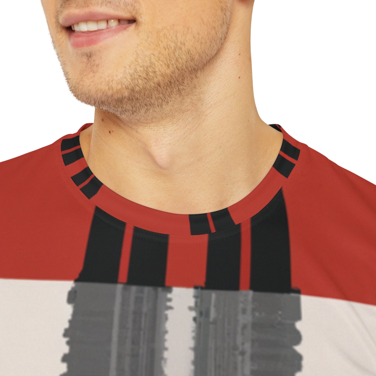 Close-up shot of the Highland Cardinal Alba Tartan Crewneck Pullover All-Over Print Short-Sleeved Shirt red black beige plaid pattern by a white man