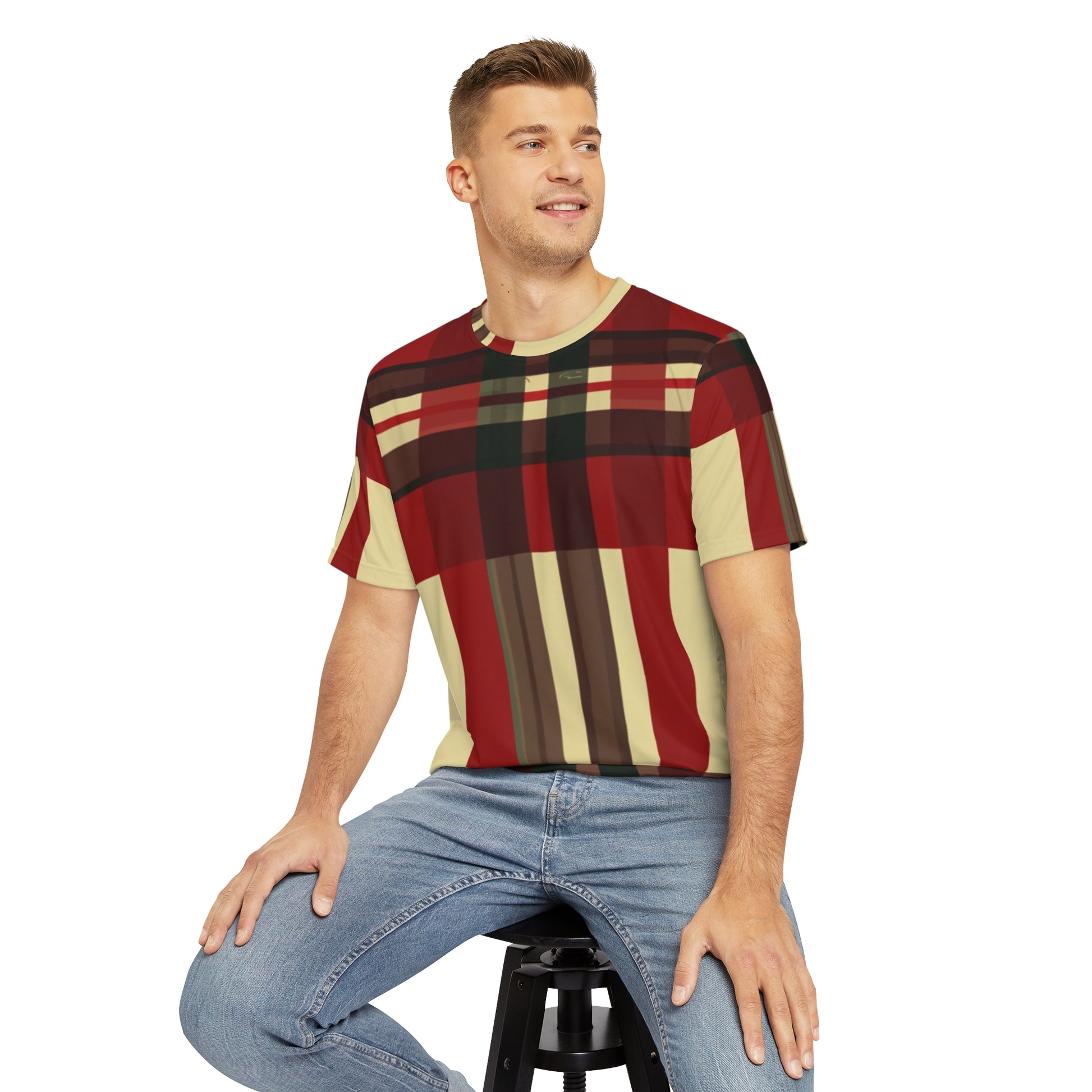 Front view of the Highland Ember Pixels Crewneck Pullover All-Over Print Short-Sleeved Shirt black red beige plaid pattern paired with casual denim pants worn by a white man sitting on a stool chair