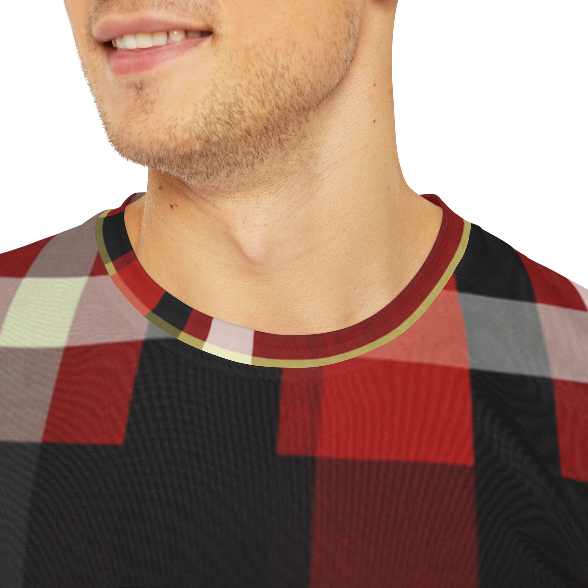 Close-up shot of the Highlander's Dawn Tartan Crewneck Pullover Short-Sleeved Shirt red black white yellow plaid pattern worn by a white man