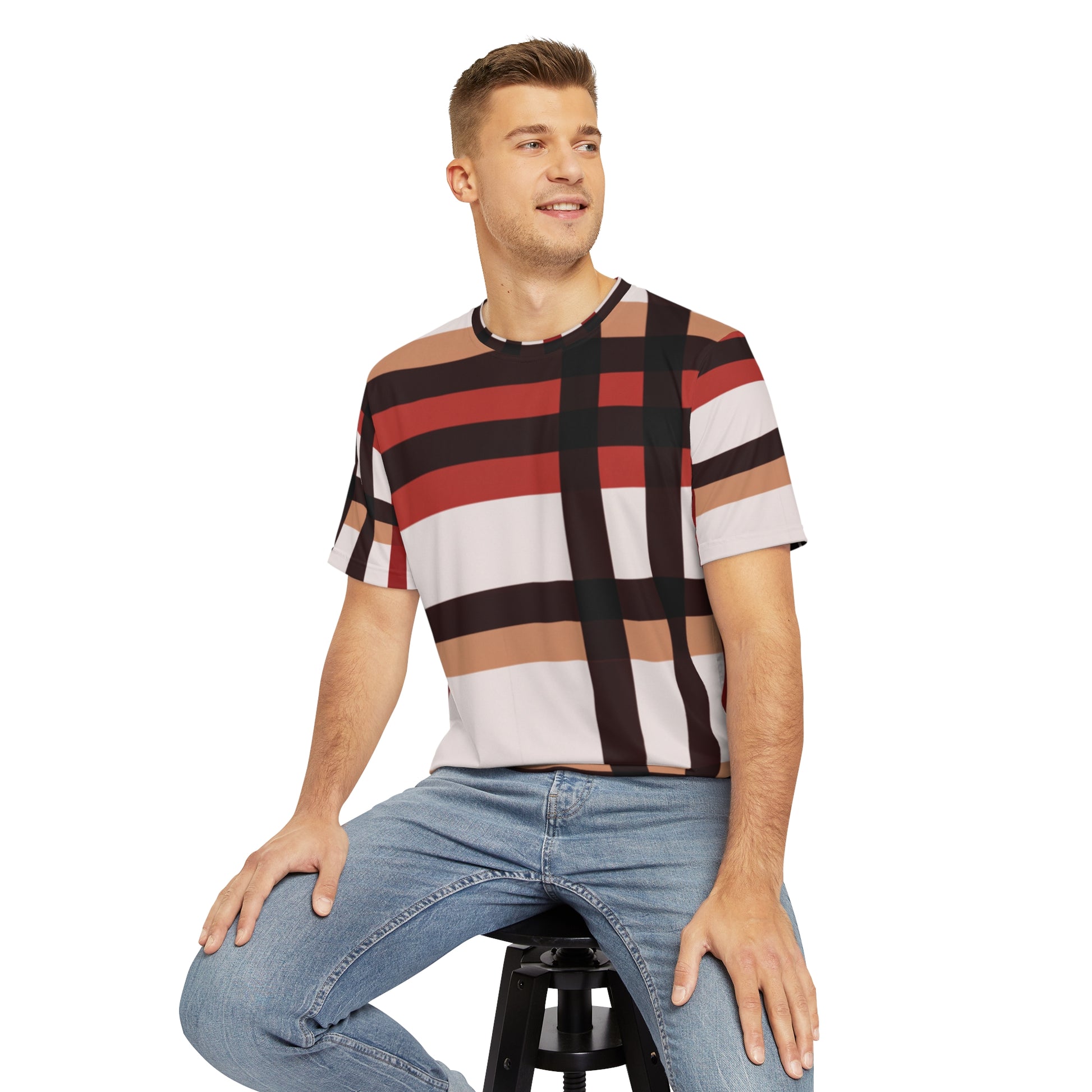 Front view of the Highlander's Array Crewneck Pullover All-Over Print Short-Sleeved Shirt white red black beige plaid pattern paired with a casual denim pants worn by a white man sitting on a stool chair