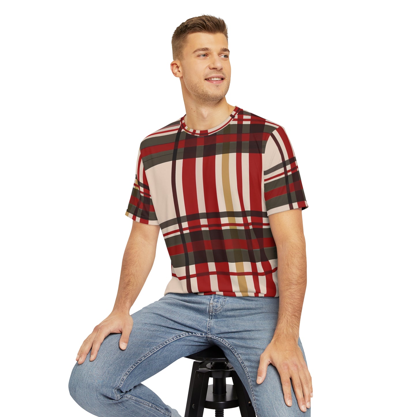 Front view of the Highland Ebony Ember Tartan Crewneck Pullover All-Over Print Short-Sleeved Shirt white black yellow plaid pattern paired with casual denim pants worn by a white man sitting on a stool chair