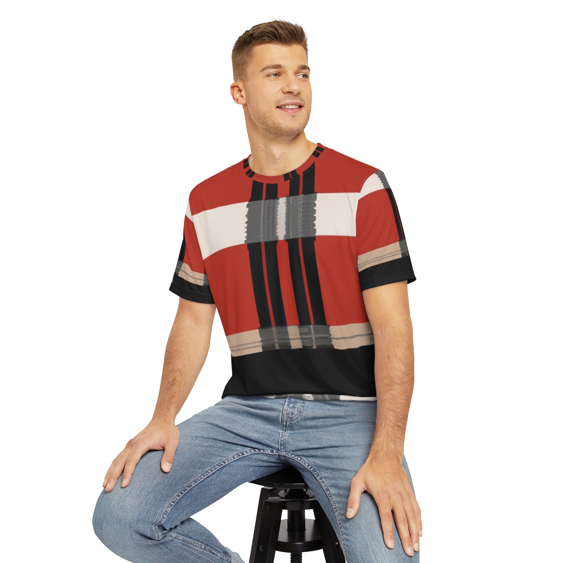 Front view of the Highland Cardinal Alba Tartan Crewneck Pullover All-Over Print Short-Sleeved Shirt red black beige plaid pattern paired with casual denim pants worn by a white man sitting on a stool chair