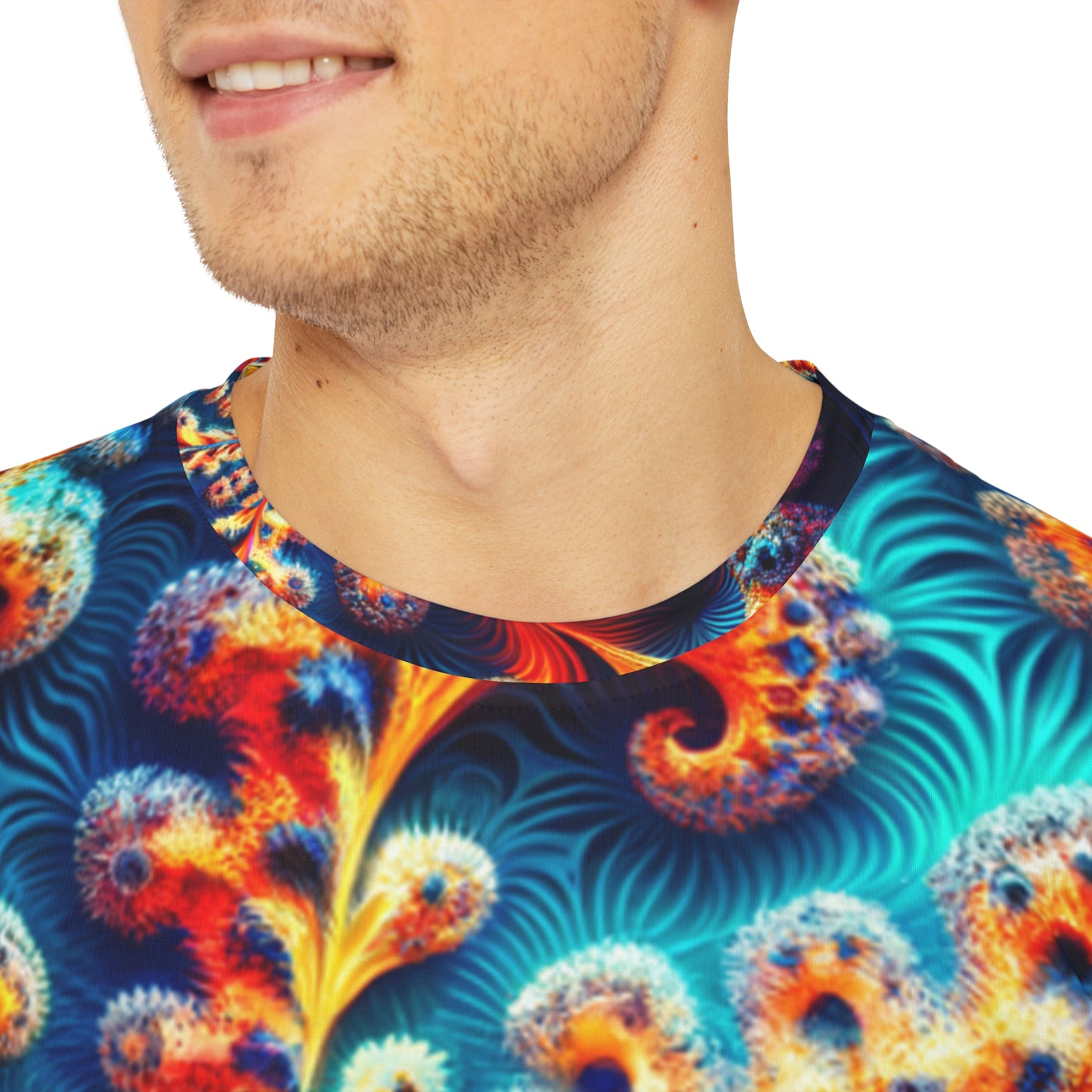 Close-up shot of the Iridescent Nautilus Swirls Crewneck Pullover All-Over Print Short-Sleeved Shirt blue red yellow orange green swirl pattern worn by a white man